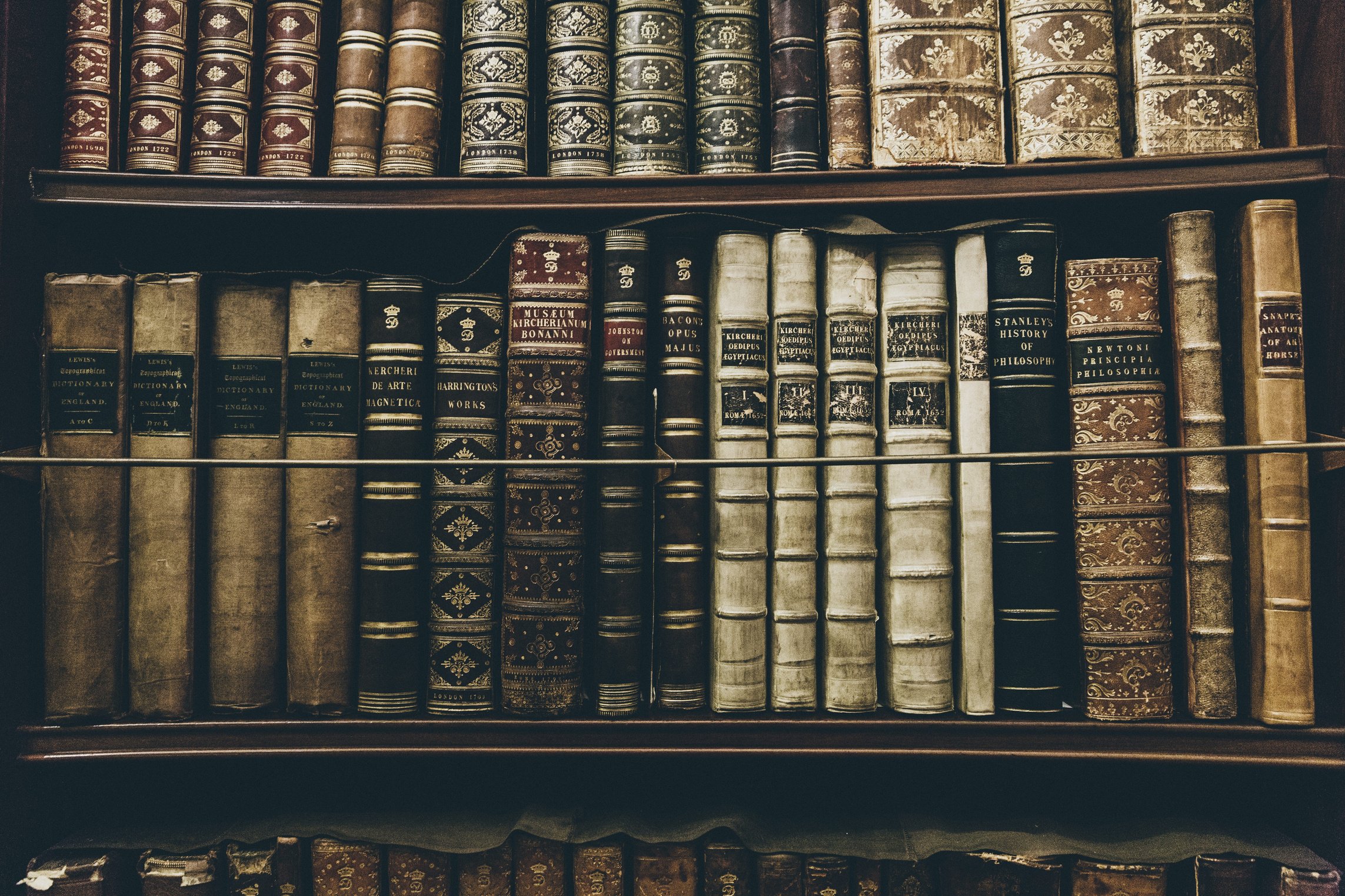 Old Books in a Shelf